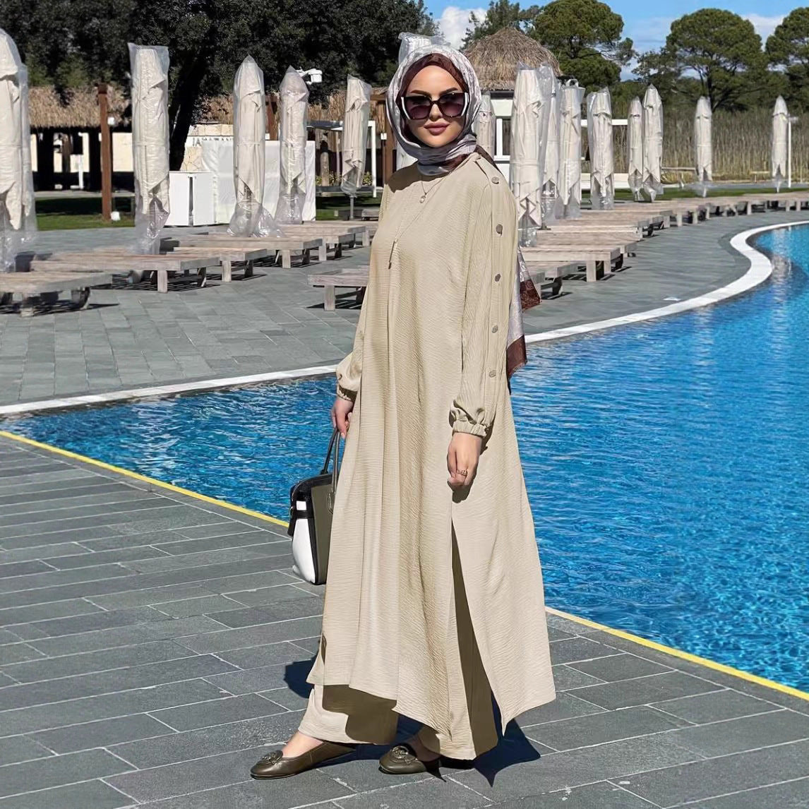Fashionable Long Set With Round Neck Gold Buttons Puff Sleeves And Patch Pockets
